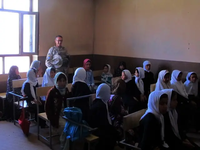 In this picture we can see the view of the classroom. In the front we can see many student sitting...